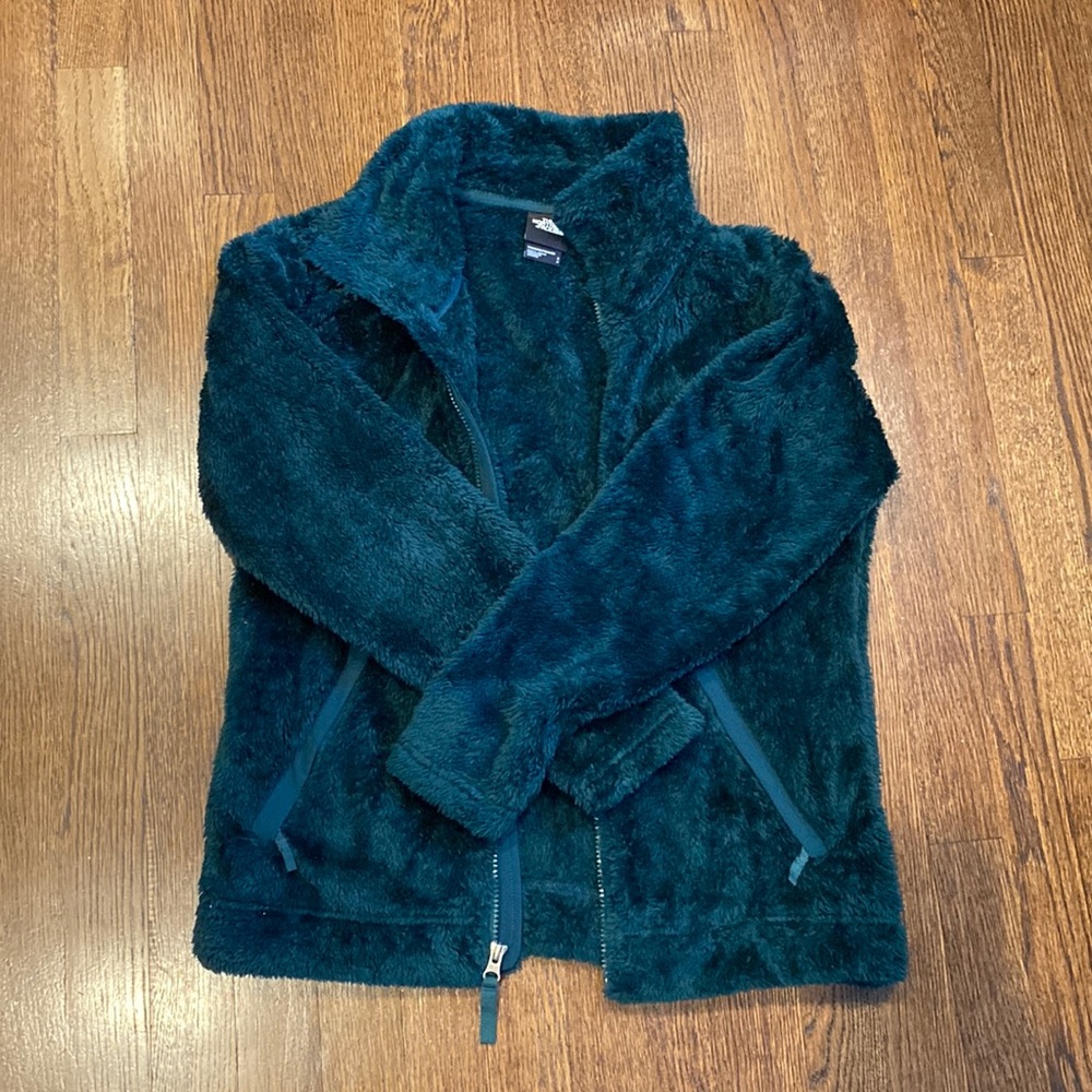 Small teal fuzzy north face zip up